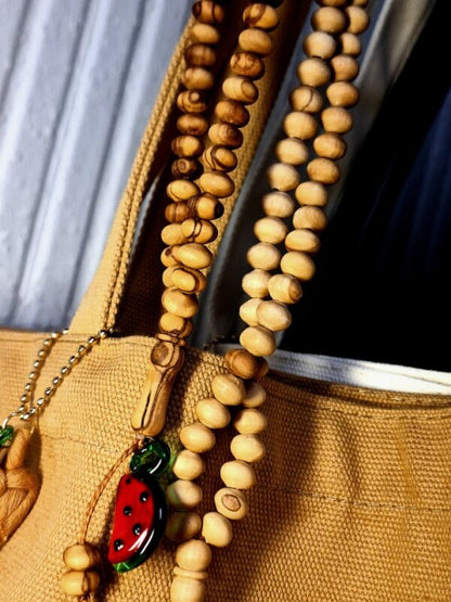 Tesbih – Chapelet – Sobha en bois d’olivier – 99 perles – Ornement verre soufflé 🍉